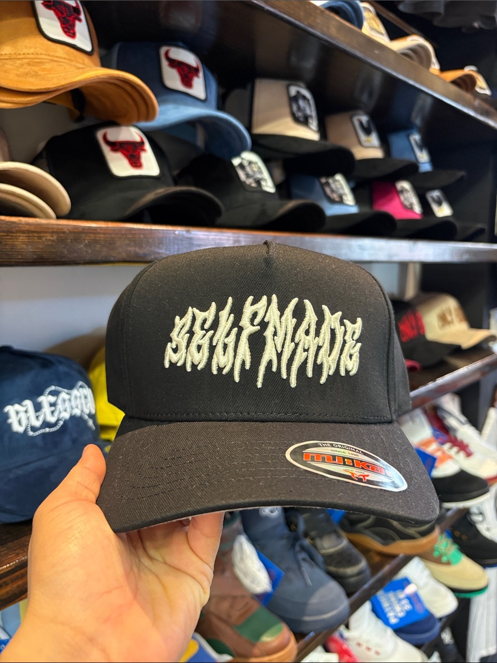 Black Trucker Hat with White Embroidered Script